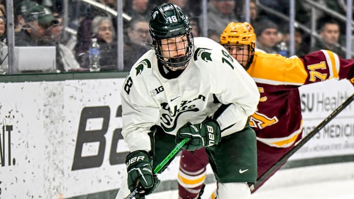 Michigan State's Joey Larson moves the puck against Minnesota during the second period on Saturday, Jan. 25, 2025, at Munn Arena in East Lansing. Michigan State's Joey Larson moves the puck against Minnesota during the second period on Saturday, Jan. 25, 2025, at Munn Arena in East Lansing.