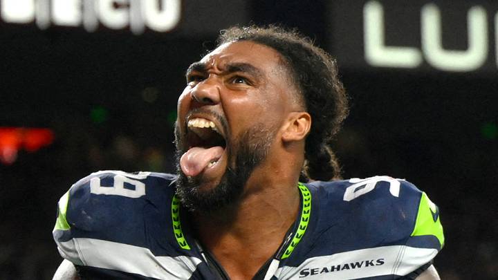 Seattle Seahawks defensive tackle Leonard Williams celebrates after an interception