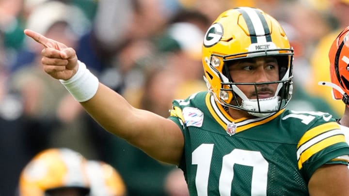 Green Bay Packers quarterback Jordan Love (10) reacts after getting a first down against Cincinnati Bengals.