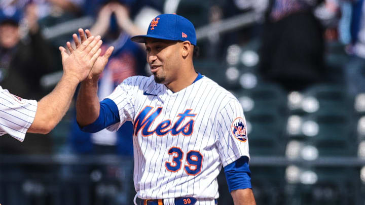 Apr 25, 2021; New York City, New York, USA; New York Mets first baseman Pete Alonso (20) and relief pitcher Edwin Diaz (39) slap hands after their game against the Washington Nationals during the top of the ninth inning at Citi Field. Mandatory Credit: Vincent Carchietta-Imagn Images