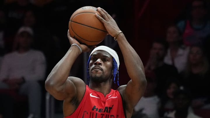 Dec 7, 2024; Miami, Florida, USA; Miami Heat forward Jimmy Butler (22) shoots the ball against Phoenix Suns guard Grayson Allen (8) during the second half at Kaseya Center. Mandatory Credit: Jim Rassol-Imagn Images Dec 7, 2024; Miami, Florida, USA; Miami Heat forward Jimmy Butler (22) shoots the ball against Phoenix Suns guard Grayson Allen (8) during the second half at Kaseya Center. Mandatory Credit: Jim Rassol-Imagn Images