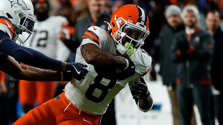 Dec 2, 2024; Denver, Colorado, USA; Cleveland Browns wide receiver Elijah Moore (8)r reaches for extra yards against Denver Broncos cornerback Levi Wallace (39) in the first quarter at Empower Field at Mile High. Mandatory Credit: Isaiah J. Downing-Imagn Images Dec 2, 2024; Denver, Colorado, USA; Cleveland Browns wide receiver Elijah Moore (8)r reaches for extra yards against Denver Broncos cornerback Levi Wallace (39) in the first quarter at Empower Field at Mile High. Mandatory Credit: Isaiah J. Downing-Imagn Images