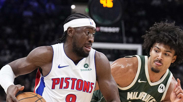 Detroit Pistons guard Caris Levert drives against Milwaukee Bucks center Jericho Sims. Detroit Pistons guard Caris Levert drives against Milwaukee Bucks center Jericho Sims.
