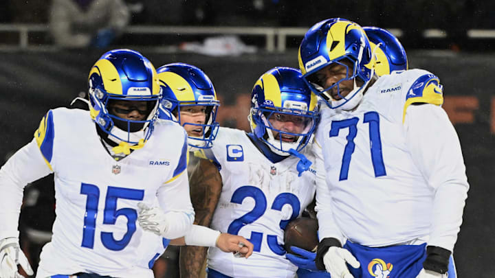 Jan 18, 2026; Chicago, IL, USA; Los Angeles Rams running back Kyren Williams (23) celebrates with wide receiver Konata Mumpfield (15), quarterback Matthew Stafford (9) and offensive tackle Warren McClendon Jr. (71) after scoring a touchdown against the Chicago Bears during the fourth quarter of an NFC Divisional Round game at Soldier Field. Mandatory Credit: Matt Marton-Imagn Images Jan 18, 2026; Chicago, IL, USA; Los Angeles Rams running back Kyren Williams (23) celebrates with wide receiver Konata Mumpfield (15), quarterback Matthew Stafford (9) and offensive tackle Warren McClendon Jr. (71) after scoring a touchdown against the Chicago Bears during the fourth quarter of an NFC Divisional Round game at Soldier Field. Mandatory Credit: Matt Marton-Imagn Images