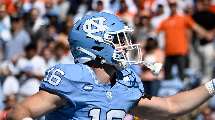 Oct 4, 2025; Chapel Hill, North Carolina, USA; Clemson Tigers wide receiver Bryant Wesco Jr. (12) attempts to catch a pass in the end zone as North Carolina Tar Heels defensive backs Coleman Bryson (16) and Marcus Allen (29) defend in the first quarter at Kenan Stadium. Mandatory Credit: Bob Donnan-Imagn Images