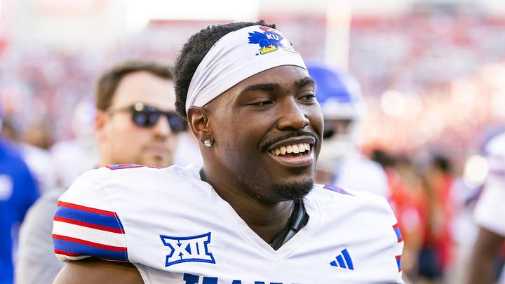 Kansas Jayhawks quarterback Jalon Daniels (6) against the Arizona Wildcats at Arizona Stadium. Kansas Jayhawks quarterback Jalon Daniels (6) against the Arizona Wildcats at Arizona Stadium.
