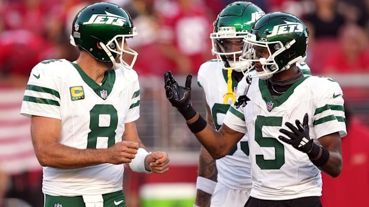 New York Jets QB Aaron Rodgers (8) and WR Garrett Wilson (5)