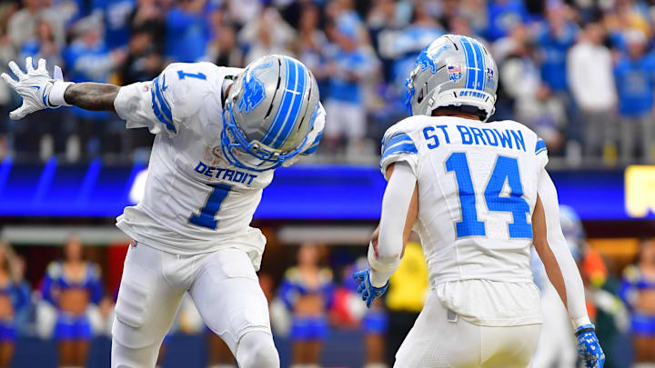 Detroit Lions wide receiver Jameson Williams (1), Detroit Lions wide receiver Amon-Ra St. Brown (14) celebrate a touchdown