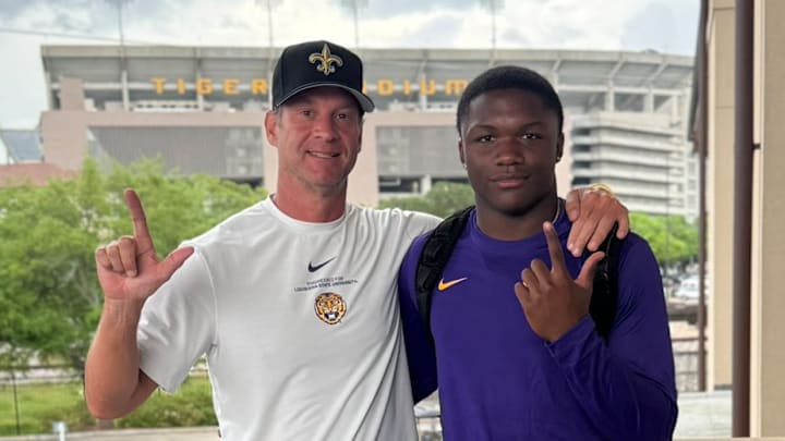 LSU Tigers head coach Lane Kiffin and five-star wide receiver Easton Royal LSU Tigers head coach Lane Kiffin and five-star wide receiver Easton Royal
