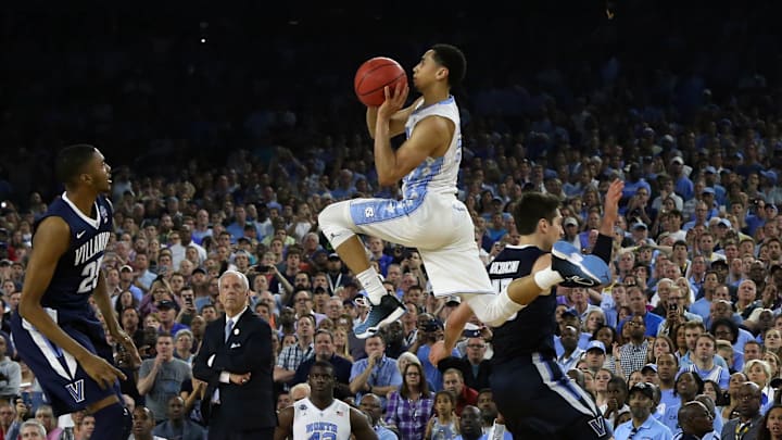 Apr 4, 2016; Houston, TX, USA; North Carolina Tar Heels guard Marcus Paige (5) hits a three point shot with 4.7 seconds over Villanova Wildcats guard Ryan Arcidiacono (15) in the championship game of the 2016 NCAA Men's Final Four at NRG Stadium. Mandatory Credit: Bob Donnan-Imagn Images