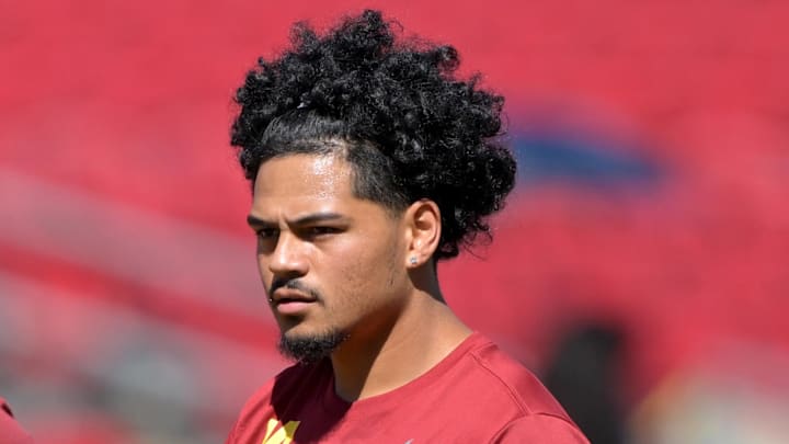 Sep 6, 2025; Los Angeles, California, USA;  USC Trojans offensive lineman J'Onre Reed (50) quarterback Jayden Maiava (14) warm up prior to the game against the Georgia Southern Eagles at United Airlines Field at Los Angeles Memorial Coliseum. Mandatory Credit: Jayne Kamin-Oncea-Imagn Images