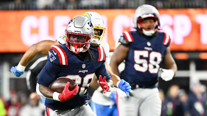 Jan 11, 2026; Foxborough, MA, USA; New England Patriots running back Rhamondre Stevenson (38) rushes during the third quarter against the Los Angeles Chargers in an AFC Wild Card Round game at Gillette Stadium. Mandatory Credit: Eric Canha-Imagn Images