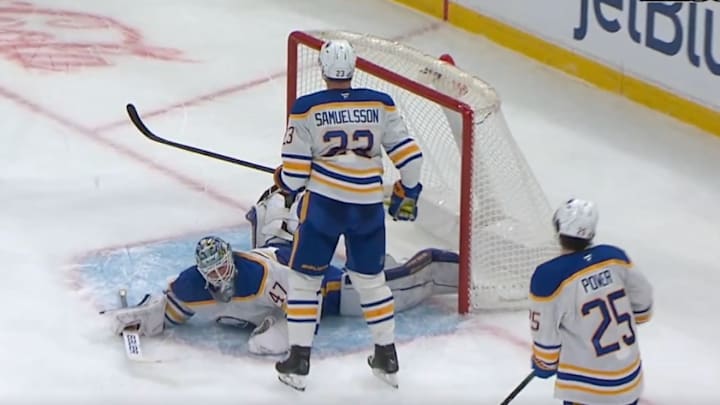 Buffalo Sabres concede late goal to the Boston Bruins after a collision in front of the net. 
