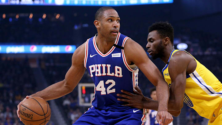 Mar 7, 2020; San Francisco, California, USA; Philadelphia 76ers forward Al Horford (42) dribbles the ball against Golden State Warriors guard Andrew Wiggins (22) in the first quarter at the Chase Center. Mandatory Credit: Cary Edmondson-Imagn Images
