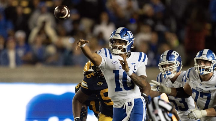 Oct 4, 2025; Berkeley, California, USA; Duke Blue Devils quarterback Darian Mensah (10) throws on the run against the California Golden Bears during the fourth quarter at California Memorial Stadium. Mandatory Credit: D. Ross Cameron-Imagn Images Oct 4, 2025; Berkeley, California, USA; Duke Blue Devils quarterback Darian Mensah (10) throws on the run against the California Golden Bears during the fourth quarter at California Memorial Stadium. Mandatory Credit: D. Ross Cameron-Imagn Images