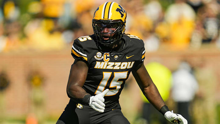 Oct 19, 2024; Columbia, Missouri, USA; Missouri Tigers defensive end Johnny Walker Jr. (15) defends Auburn Tigers tight end Micah Riley (84) during the second half at Faurot Field at Memorial Stadium. Mandatory Credit: Jay Biggerstaff-Imagn Images