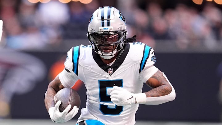 Nov 16, 2025; Atlanta, Georgia, USA;  Carolina Panthers running back Rico Dowdle (5) runs with the ball in the first quarter against the Atlanta Falcons at Mercedes-Benz Stadium. Mandatory Credit: Dale Zanine-Imagn Images