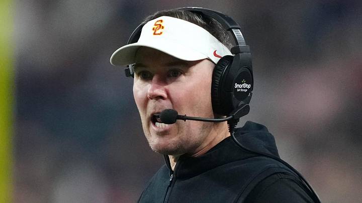 Dec 27, 2024; Las Vegas, NV, USA; Southern California Trojans head coach Lincoln Riley reacts against the Texas A&M Aggies in the first half at Allegiant Stadium. Mandatory Credit: Kirby Lee-Imagn Images Dec 27, 2024; Las Vegas, NV, USA; Southern California Trojans head coach Lincoln Riley reacts against the Texas A&M Aggies in the first half at Allegiant Stadium. Mandatory Credit: Kirby Lee-Imagn Images