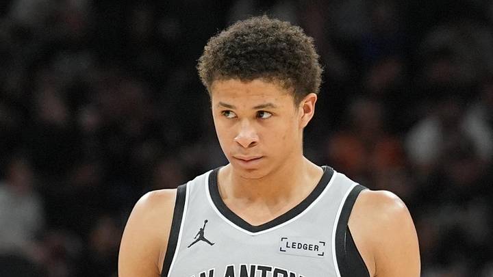 Feb 7, 2026; San Antonio, Texas, USA;  San Antonio Spurs forward Carter Bryant (11) walks up the court in the second half against the Dallas Mavericks at Frost Bank Center. Mandatory Credit: Daniel Dunn-Imagn Images