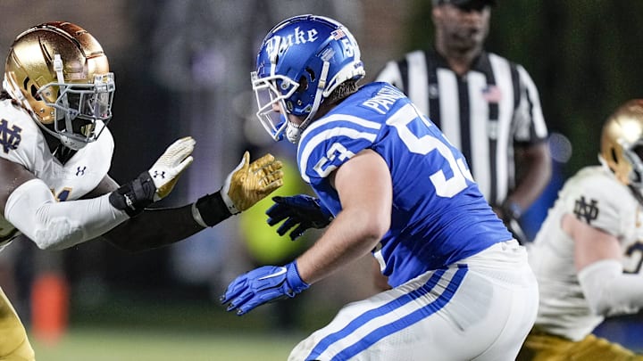 Sep 30, 2023; Durham, North Carolina, USA; Notre Dame Fighting Irish defensive lineman Nana Osafo-Mensah (31) against Duke Blue Devils offensive lineman Brian Parker II (53) during the second half at Wallace Wade Stadium. Mandatory Credit: Jim Dedmon-Imagn Images Sep 30, 2023; Durham, North Carolina, USA; Notre Dame Fighting Irish defensive lineman Nana Osafo-Mensah (31) against Duke Blue Devils offensive lineman Brian Parker II (53) during the second half at Wallace Wade Stadium. Mandatory Credit: Jim Dedmon-Imagn Images