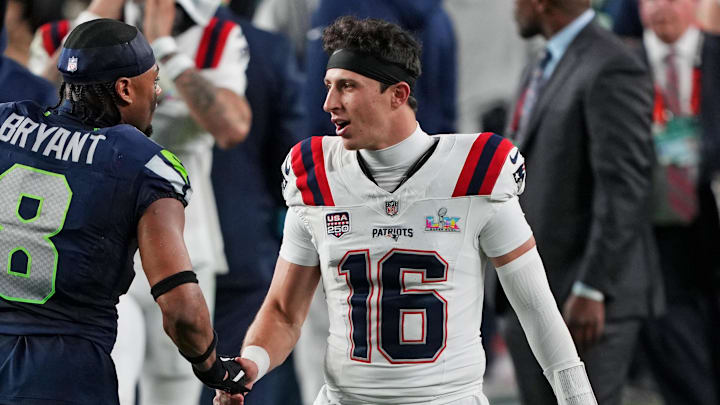 Feb 8, 2026; Santa Clara, CA, USA; New England Patriots quarterback Tommy DeVito (16) and Seattle Seahawks safety Coby Bryant (8) shake hands after the game in Super Bowl LX at Levi's Stadium. Mandatory Credit: Darren Yamashita-Imagn Images