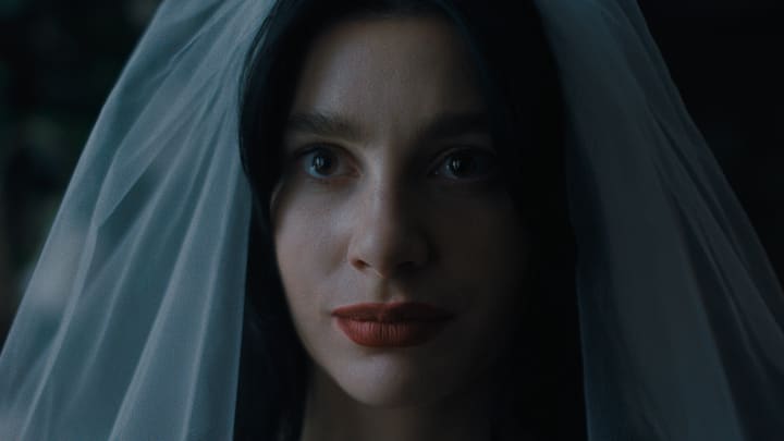 Something Very Bad Is Going to Happen. Camila Morrone as Rachel Harkin in Something Very Bad Is Going to Happen