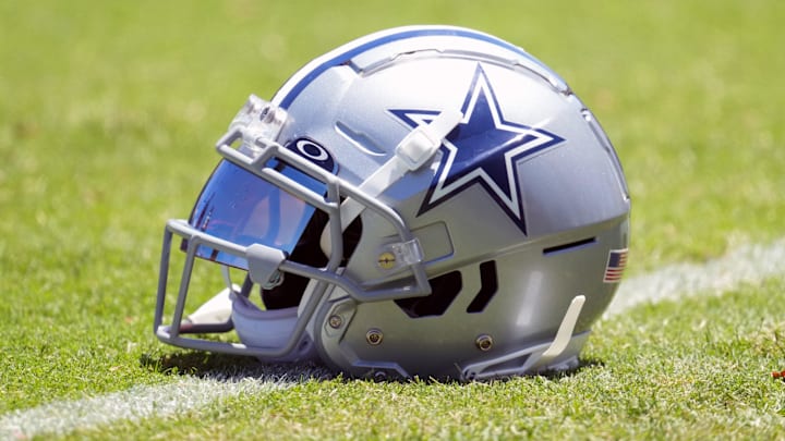 Jul 27, 2023; Oxnard, CA, USA; A Dallas Cowboys helmet with Oakley visor at training camp at Marriott Residence Inn-River Ridge Playing Fields. Mandatory Credit: Kirby Lee-Imagn Images Jul 27, 2023; Oxnard, CA, USA; A Dallas Cowboys helmet with Oakley visor at training camp at Marriott Residence Inn-River Ridge Playing Fields. Mandatory Credit: Kirby Lee-Imagn Images