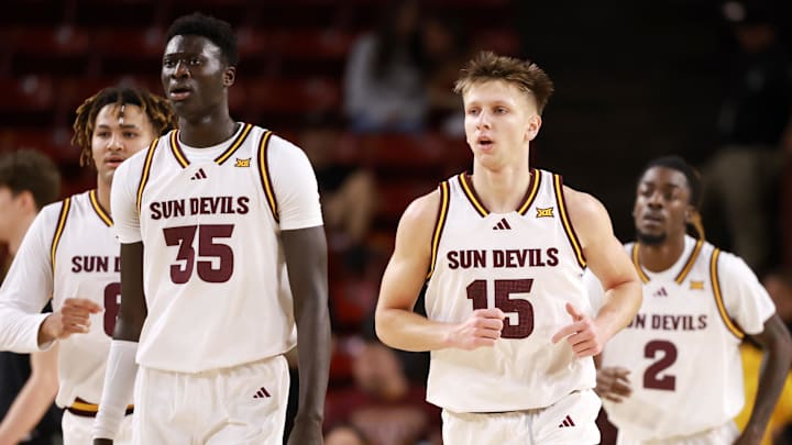 Jan 3, 2026; Tempe, Arizona, USA; Arizona State Sun Devils center Massamba Diop (35) and guard Noah Meeusen (15) against the Colorado Buffaloes at Desert Financial Arena. Mandatory Credit: Mark J. Rebilas-Imagn Images