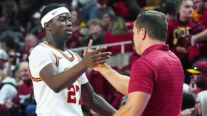 Iowa State Cyclones forward Killyan Toure (27) gets congratulation from men's basketball head coach T.J. Otzelberger during the second half against UCF in the Big-12 conference game on Jan. 20, 2026, at Hilton Coliseum in Ames, Iowa.