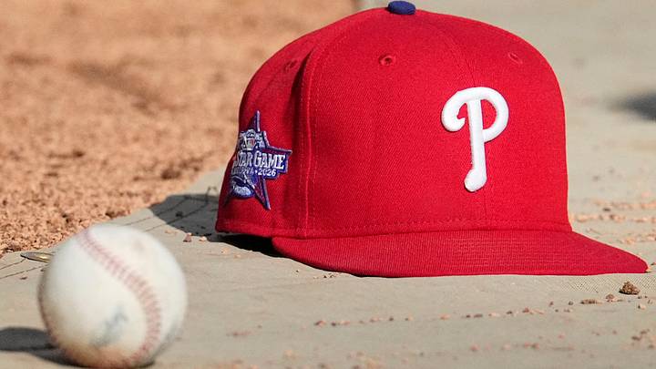 Jun 12, 2026; Milwaukee, Wisconsin, USA; Philadelphia Phillies hat on the field during batting practice before a game against the Milwaukee Brewers at American Family Field. Mandatory Credit: Michael McLoone-Imagn Images