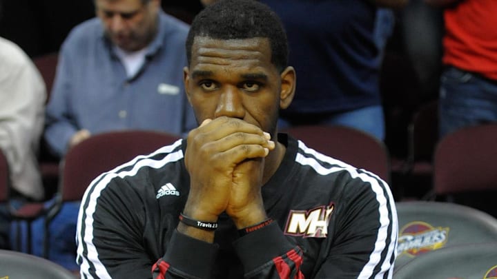 Mar 18, 2014; Cleveland, OH, USA; Miami Heat center Greg Oden (20) sits on the bench prior to a game against the Cleveland Cavaliers at Quicken Loans Arena. Miami won 100-96. Mandatory Credit: David Richard-Imagn Images