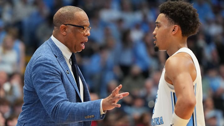 Feb 28, 2026; Chapel Hill, North Carolina, USA; North Carolina Tar Heels head coach Hubert Davis with guard Seth Trimble (7) in the second half at Dean E. Smith Center. Mandatory Credit: Bob Donnan-Imagn Images