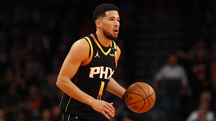 Nov 26, 2024; Phoenix, Arizona, USA; Phoenix Suns guard Devin Booker (1) against the Los Angeles Lakers during an NBA Cup game at Footprint Center. Mandatory Credit: Mark J. Rebilas-Imagn Images Nov 26, 2024; Phoenix, Arizona, USA; Phoenix Suns guard Devin Booker (1) against the Los Angeles Lakers during an NBA Cup game at Footprint Center. Mandatory Credit: Mark J. Rebilas-Imagn Images