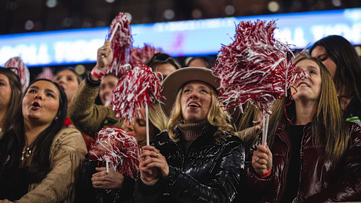 Nov 30, 2024; Tuscaloosa, Alabama, USA; Alabama Crimson Tide fans cheer on their team during the third quarter against the Auburn Tigers at Bryant-Denny Stadium. Nov 30, 2024; Tuscaloosa, Alabama, USA; Alabama Crimson Tide fans cheer on their team during the third quarter against the Auburn Tigers at Bryant-Denny Stadium.