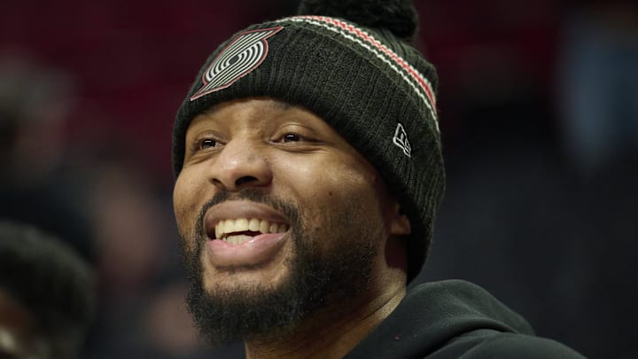 Nov 30, 2025; Portland, Oregon, USA; Portland Trail Blazers guard Damian Lillard (0) shares a laugh before a game against the Oklahoma City Thunder at Moda Center. Mandatory Credit: Troy Wayrynen-Imagn Images