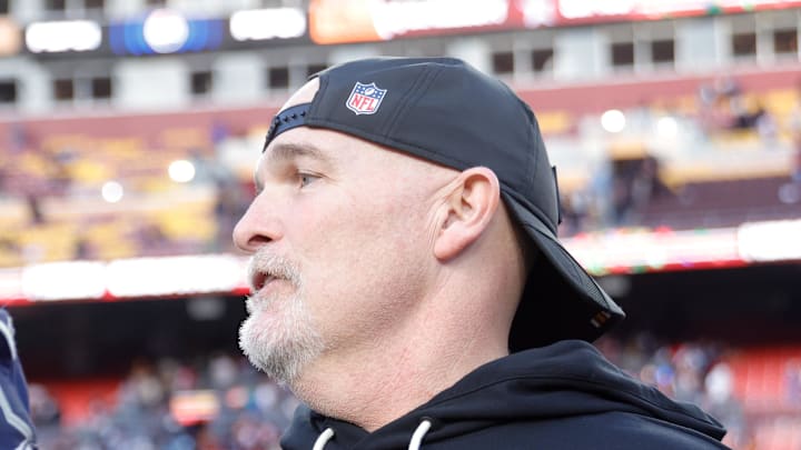 Washington Commanders head coach Dan Quinn speaks to Dallas Cowboys wide receiver Jalen Tolbert. Washington Commanders head coach Dan Quinn speaks to Dallas Cowboys wide receiver Jalen Tolbert.