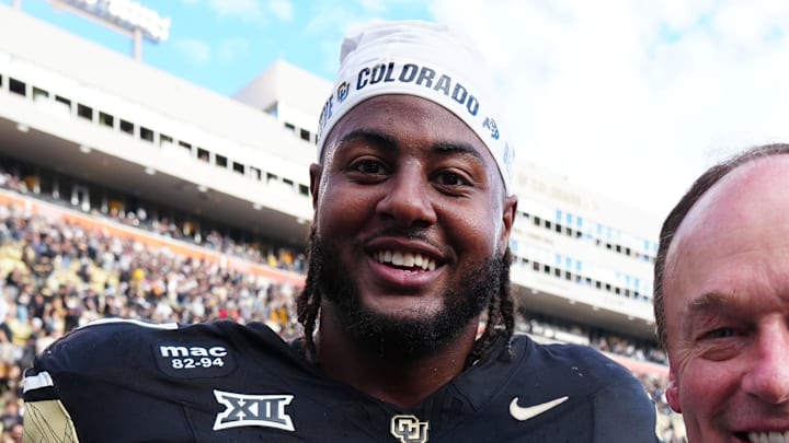 Oct 11, 2025; Boulder, Colorado, USA; Colorado Buffaloes offensive lineman Jordan Seaton (77) and athletic director Rick George following the win against the Iowa State Cyclones at Folsom Field. Oct 11, 2025; Boulder, Colorado, USA; Colorado Buffaloes offensive lineman Jordan Seaton (77) and athletic director Rick George following the win against the Iowa State Cyclones at Folsom Field.