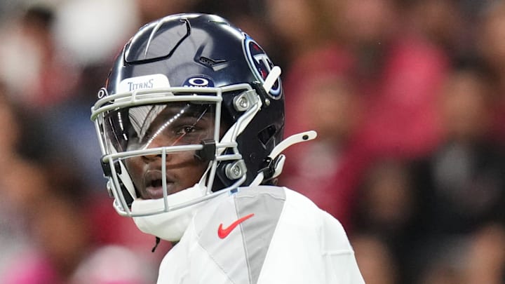 Tennessee Titans quarterback Cam Ward looks to throw the ball against the Arizona Cardinals.