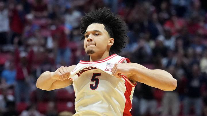 Arizona Wildcats guard Brayden Burries (5) reacts in the second half against the Utah State Aggies during a second round game of the men's 2026 NCAA Tournament at Viejas Arena on March 22, 2026.