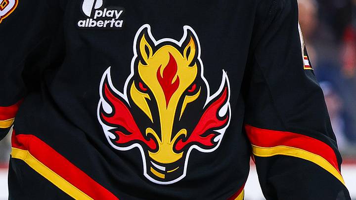 Mar 5, 2026; Calgary, Alberta, CAN; Calgary Flames defenseman Zach Whitecloud (28) against the Ottawa Senators during the third period at Scotiabank Saddledome. Mandatory Credit: Sergei Belski-Imagn Images