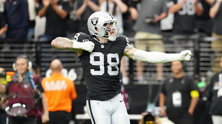 Oct 12, 2025; Paradise, Nevada, USA; Las Vegas Raiders defensive end Maxx Crosby (98) reacts after a play during the second half against the Tennessee Titans at Allegiant Stadium. Mandatory Credit: Stephen R. Sylvanie-Imagn Images Oct 12, 2025; Paradise, Nevada, USA; Las Vegas Raiders defensive end Maxx Crosby (98) reacts after a play during the second half against the Tennessee Titans at Allegiant Stadium. Mandatory Credit: Stephen R. Sylvanie-Imagn Images