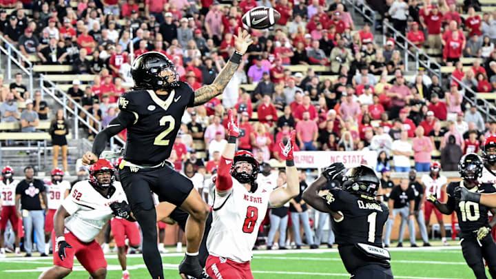 Sep 11, 2025; Winston-Salem, North Carolina, USA;  Wake Forest Demon Deacons quarterback Robby Ashford (2) knocks down his own pass in the second half against the North Carolina State Wolfpack at Allegacy Federal Credit Union Stadium. Mandatory Credit: Luke Jamroz-Imagn Images 