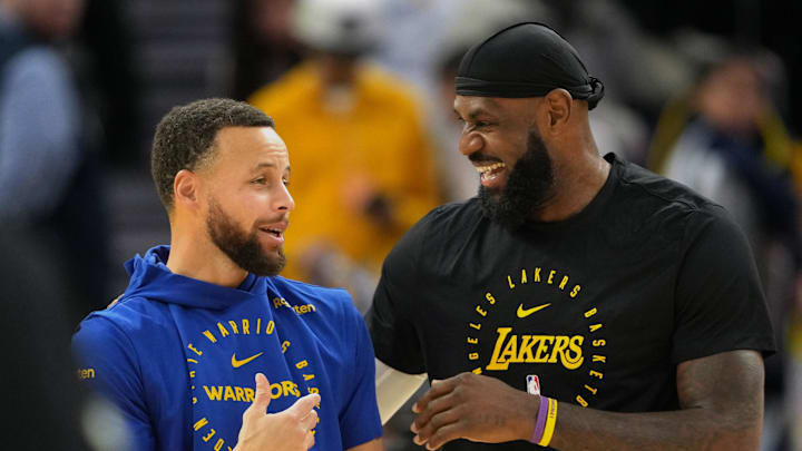 Dec 25, 2024; San Francisco, California, USA; Golden State Warriors guard Stephen Curry (left) and Los Angeles Lakers forward LeBron James (right) talk before the game at Chase Center. Mandatory Credit: Darren Yamashita-Imagn Images Dec 25, 2024; San Francisco, California, USA; Golden State Warriors guard Stephen Curry (left) and Los Angeles Lakers forward LeBron James (right) talk before the game at Chase Center. Mandatory Credit: Darren Yamashita-Imagn Images