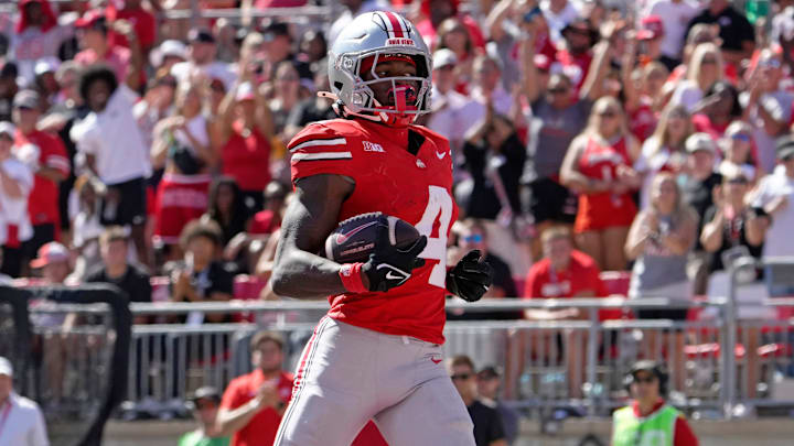 Sept. 21, 2024; Columbus, Ohio, USA;
Ohio State Buckeyes wide receiver Jeremiah Smith (4) cruises into the endzone for a touchdown during the second half of an NCAA Division I football game against the Marshall Thundering Herd at Ohio Stadium on Saturday.