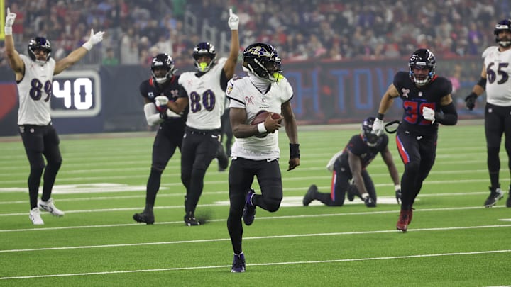 Jackson races to the end zone as the Ravens blow out the Texans on Christmas.