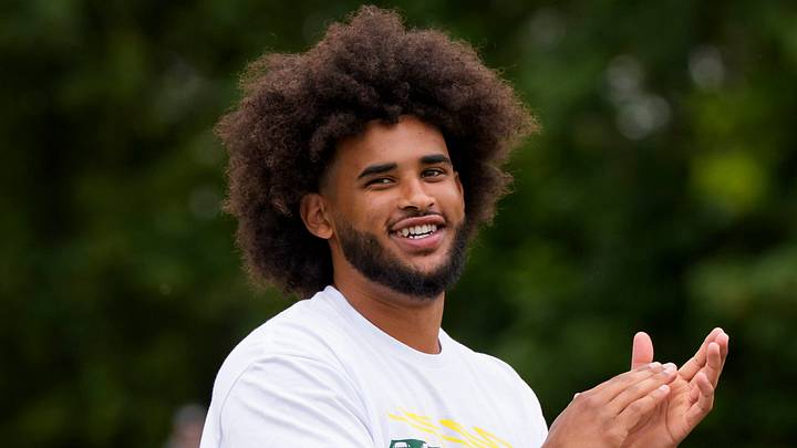 Oregon quarterback Dante Moore celebrates after a reception during a youth football camp at Marist Catholic High School on June 20, 2026, in Eugene, Oregon. Oregon quarterback Dante Moore celebrates after a reception during a youth football camp at Marist Catholic High School on June 20, 2026, in Eugene, Oregon.
