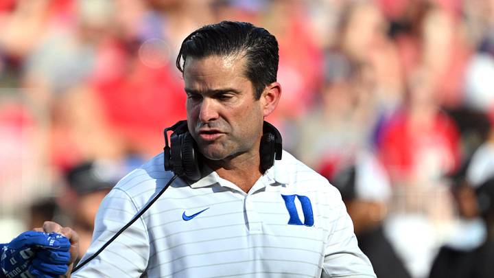 Sep 20, 2025; Durham, North Carolina, USA; Duke Blue Devils head coach Manny Diaz interacts with safety Ma'khi Jones (26) during the first quarter against the NC State Wolfpack at Wallace Wade Stadium. Mandatory Credit: Zachary Taft-Imagn Images Sep 20, 2025; Durham, North Carolina, USA; Duke Blue Devils head coach Manny Diaz interacts with safety Ma'khi Jones (26) during the first quarter against the NC State Wolfpack at Wallace Wade Stadium. Mandatory Credit: Zachary Taft-Imagn Images