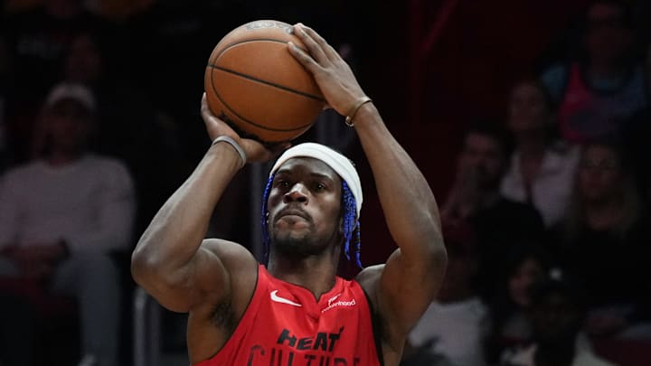 Dec 7, 2024; Miami, Florida, USA; Miami Heat forward Jimmy Butler (22) shoots the ball against Phoenix Suns guard Grayson Allen (8) during the second half at Kaseya Center. Mandatory Credit: Jim Rassol-Imagn Images Dec 7, 2024; Miami, Florida, USA; Miami Heat forward Jimmy Butler (22) shoots the ball against Phoenix Suns guard Grayson Allen (8) during the second half at Kaseya Center. Mandatory Credit: Jim Rassol-Imagn Images