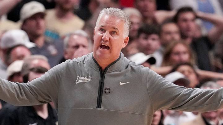 Purdue Boilermakers head coach Matt Painter speaks with a referee during an NCAA Tournament game. Purdue Boilermakers head coach Matt Painter speaks with a referee during an NCAA Tournament game.