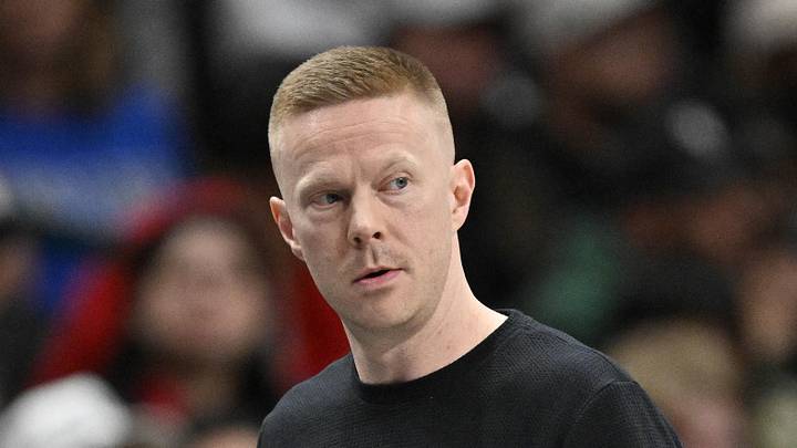 San Antonio Spurs associate coach Sean Sweeney looks on during the second half against the Dallas Mavericks. San Antonio Spurs associate coach Sean Sweeney looks on during the second half against the Dallas Mavericks.
